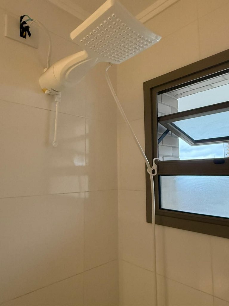 Boqueirão: sacada, Smart TV e 600 m da praia