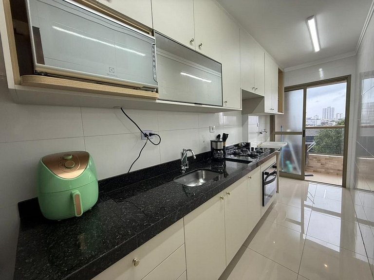 Boqueirão: sacada, Smart TV e 600 m da praia