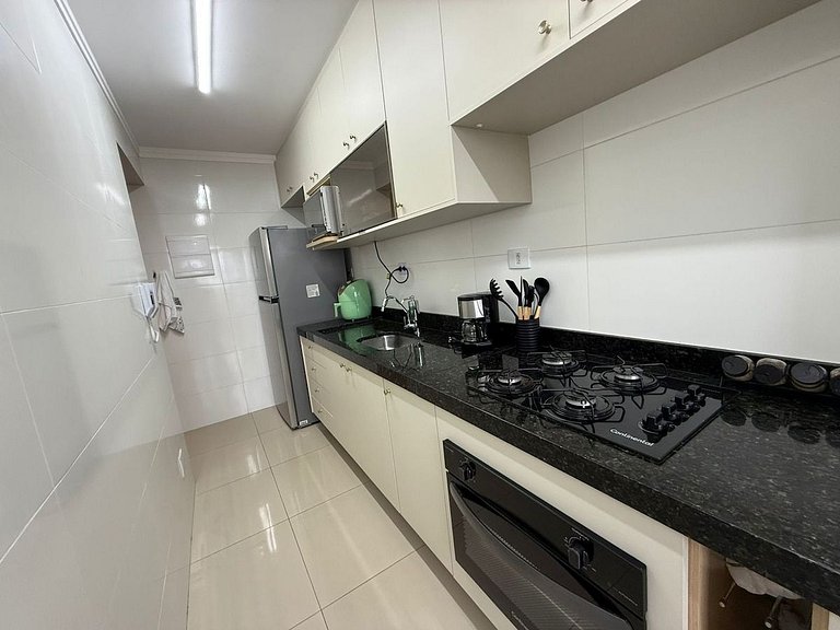 Boqueirão: sacada, Smart TV e 600 m da praia